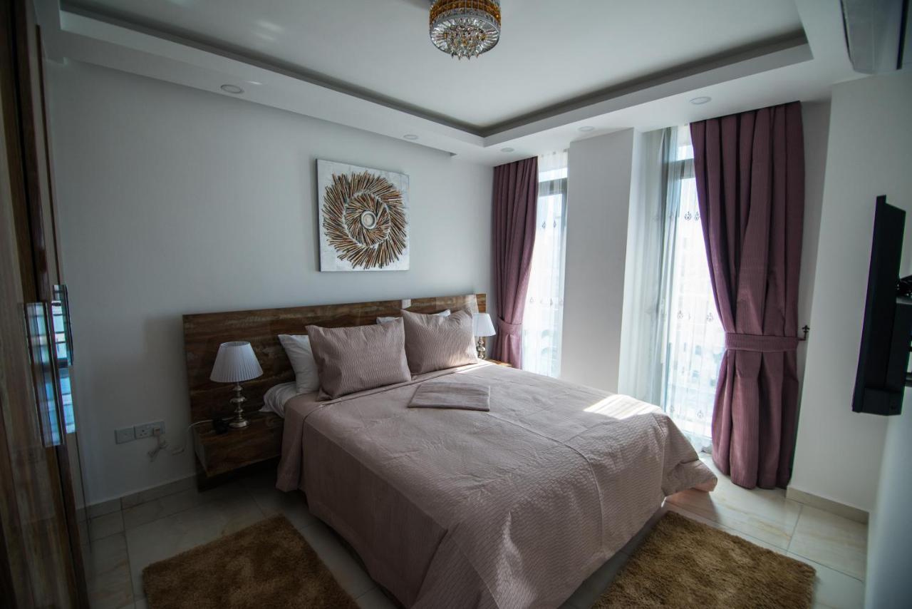 Aquamarine Luxury Residence 凯里尼亚 外观 照片