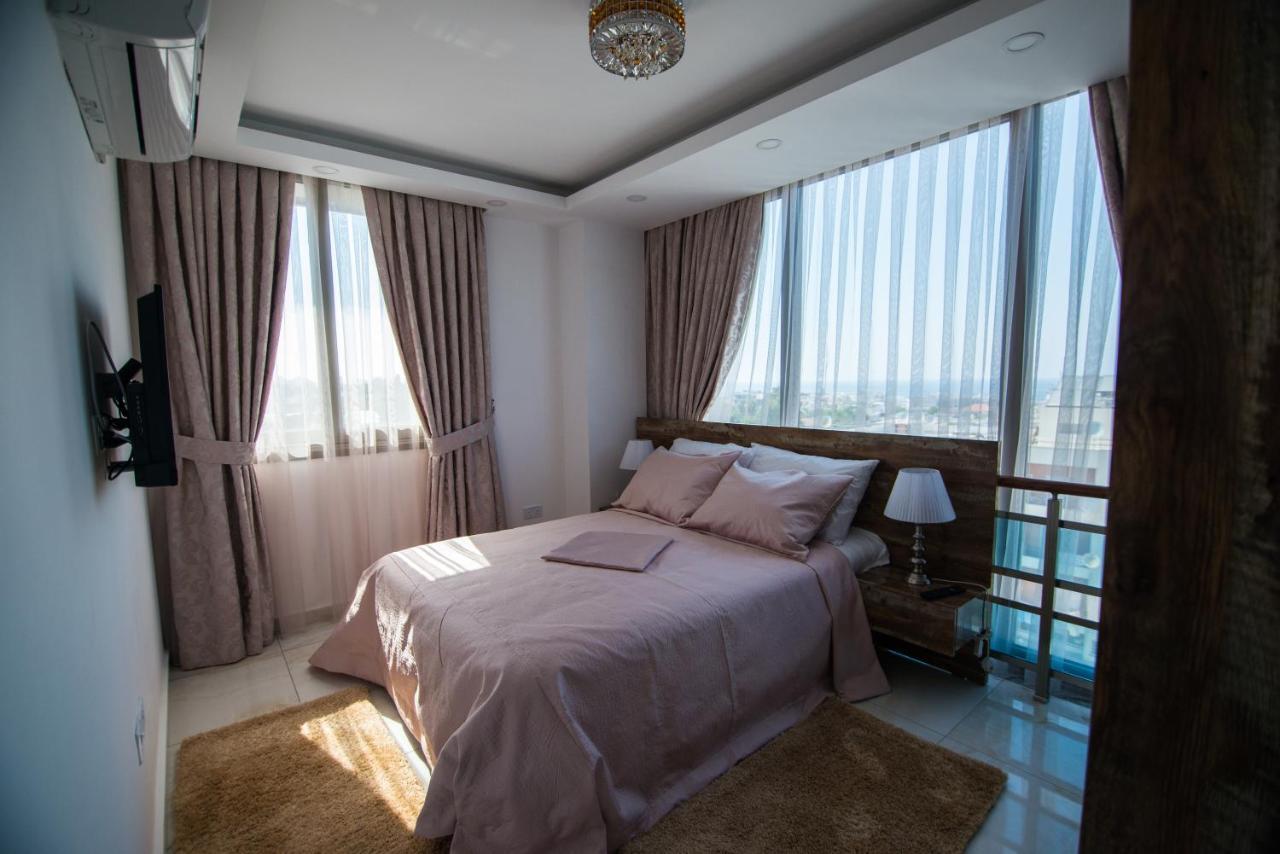 Aquamarine Luxury Residence 凯里尼亚 外观 照片